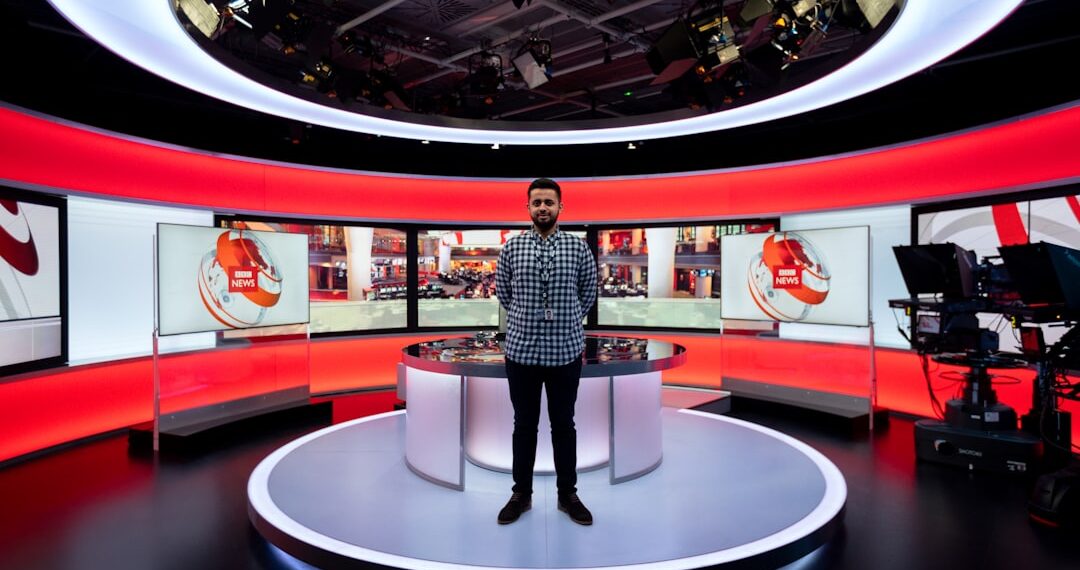 Male broadcast engineer in studio