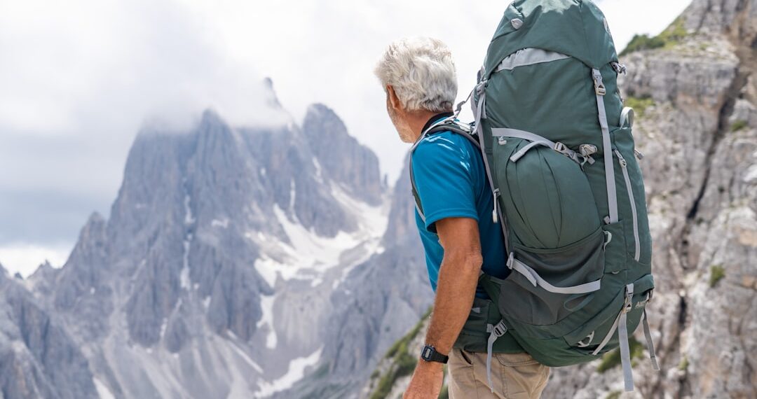 Man backpacking near the Cadini di Misurina in the Italian Dolomites