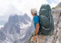 Man backpacking near the Cadini di Misurina in the Italian Dolomites