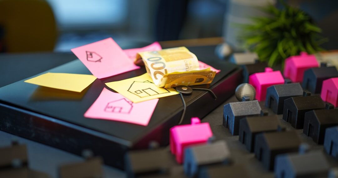 Real estate budget planning property investment euro money. Conceptual photo showing financial preparation, housing market strategy, euro banknotes, sticky notes with house drawings and model homes