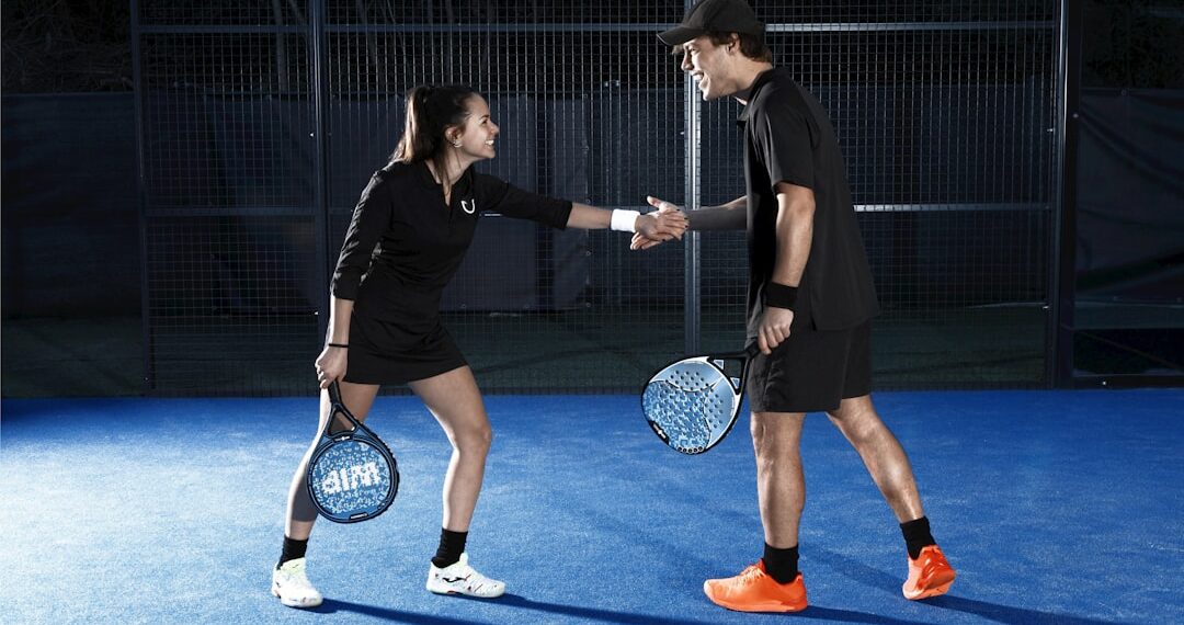 Woman and man rejoice during a padel match (Ph: Emanuela D'Ambrosi)